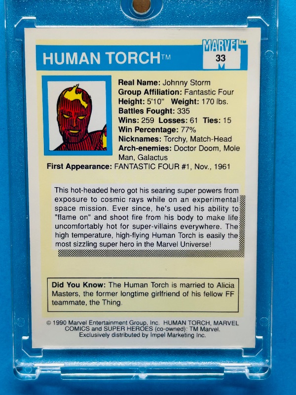 Photo 1 of 593667…Human-Torch Marvel card  in hard plastic case