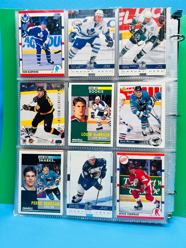 Photo 1 of 593700… final sale no return/refund- 270 mixed hockey cards in binder