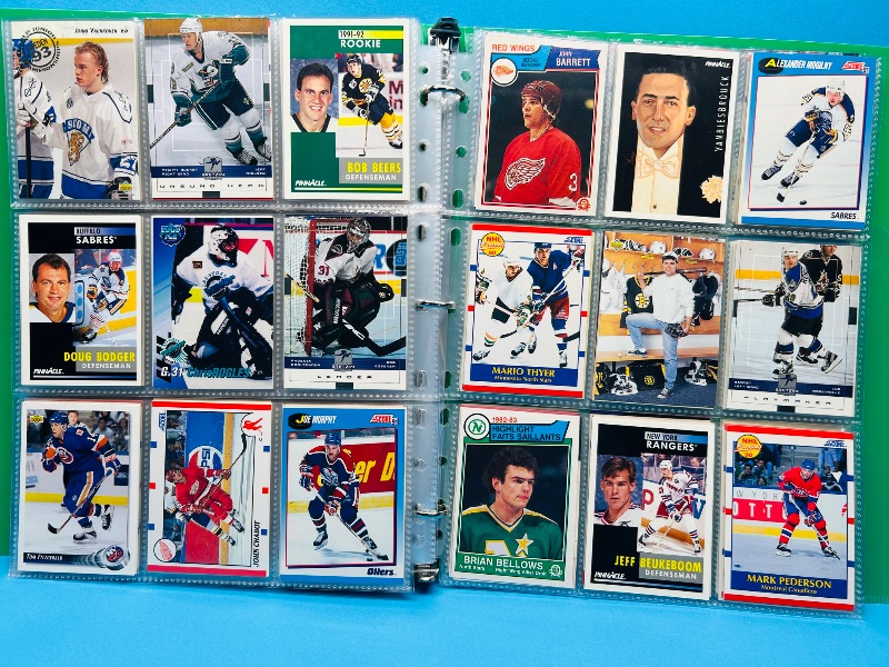 Photo 1 of 593700… final sale no return/refund- 270 mixed hockey cards in binder