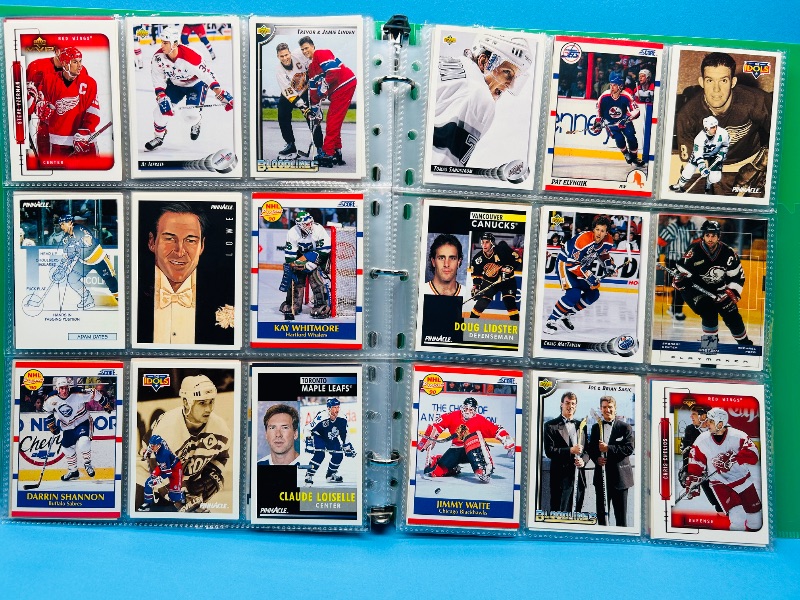 Photo 1 of 593700… final sale no return/refund- 270 mixed hockey cards in binder