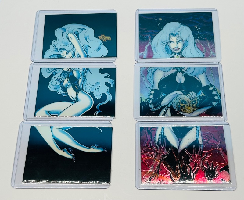 Photo 1 of 593720…6 chromium Lady Death puzzle cards in hard plastic sleeves 