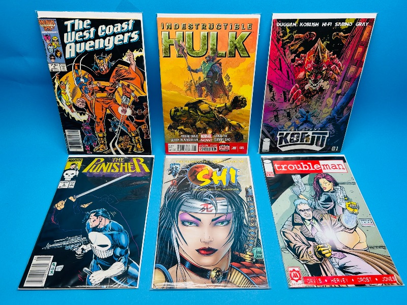 Photo 1 of 593735…6  comics in plastic sleeves 