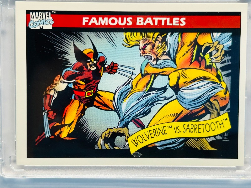 Photo 1 of 593747…Marvel Wolverine vs. sabertooth card in hard plastic case