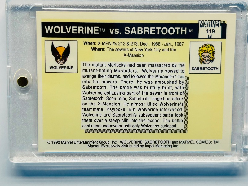 Photo 1 of 593747…Marvel Wolverine vs. sabertooth card in hard plastic case