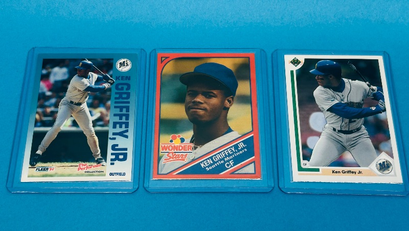 Photo 1 of 593812…3 Ken Griffey Jr. cards in hard plastic sleeves