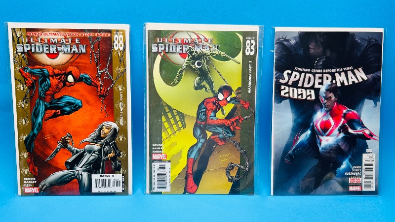 Photo 1 of 593868…3 ultimate Spiderman  comics in plastic sleeves 