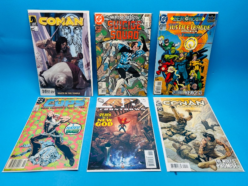 Photo 1 of 593874…6  comics in plastic sleeves 