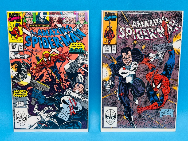 Photo 1 of 593937…2 vintage Spider-Man  comics in plastic sleeves