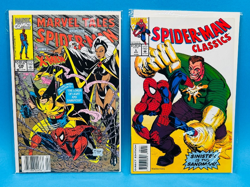 Photo 1 of 593941…2 vintage Spider-Man  comics in plastic sleeves 