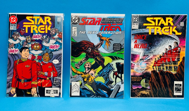 Photo 1 of 593945…3 vintage Star Trek comics in plastic sleeves