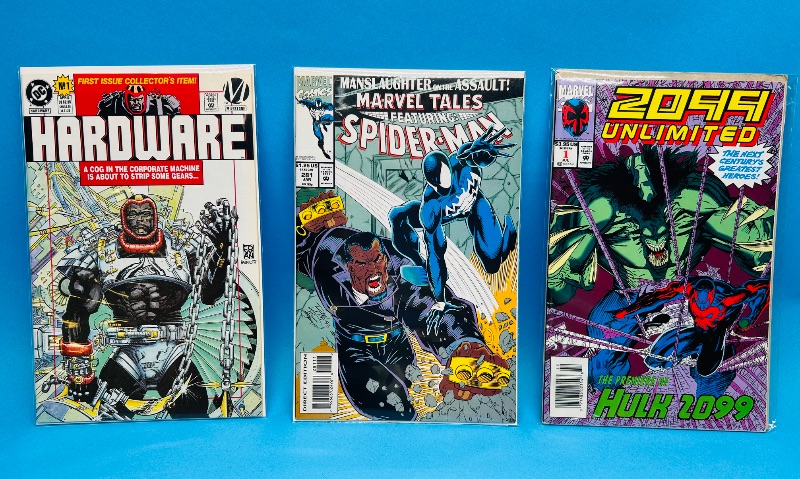 Photo 1 of 593956…3  comics in plastic sleeves 