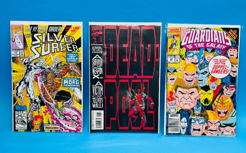 Photo 1 of 593957…3  comics in plastic sleeves 