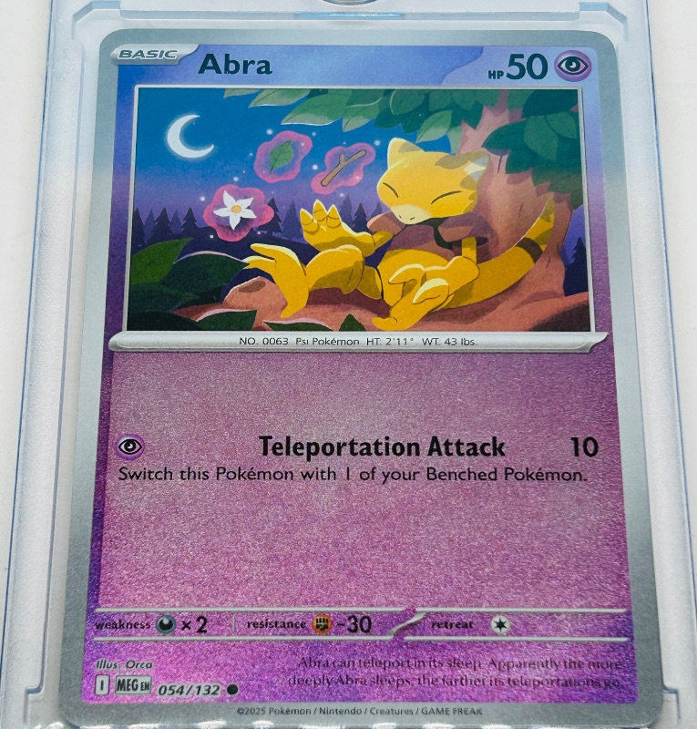 View 3 of 593961…holo Abra Pokémon card in hard plastic case