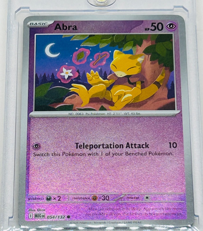 View 1 of 593961…holo Abra Pokémon card in hard plastic case