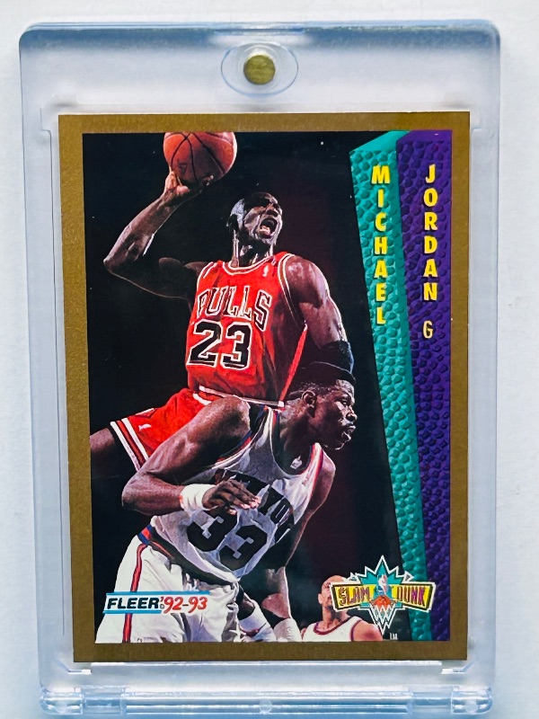 Photo 1 of 593991…Michael Jordan slam dunk card 273  in hard plastic case