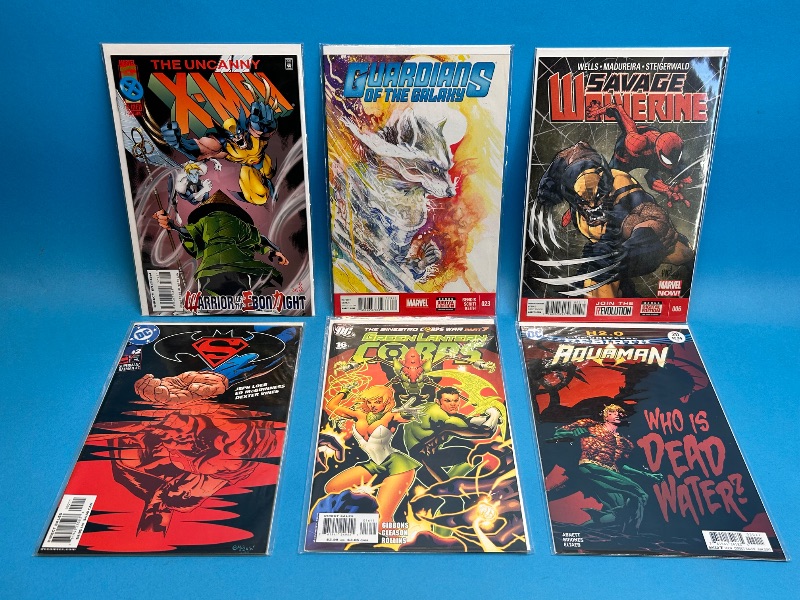 Photo 1 of 594042…6  comics in plastic sleeves 