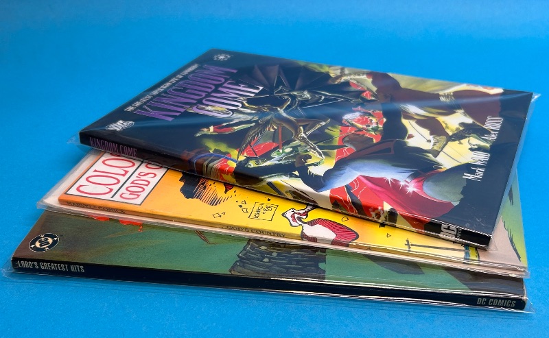Photo 1 of 594048…3 softcover comic novels in plastic sleeves 