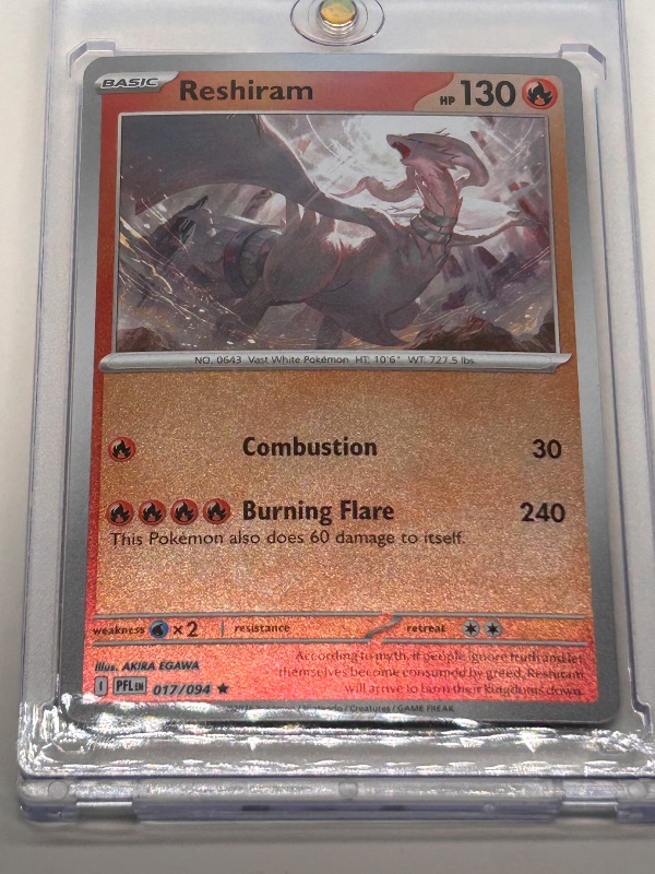 Photo 1 of 594082…holo foil Reshiram Pokémon card in hard plastic case