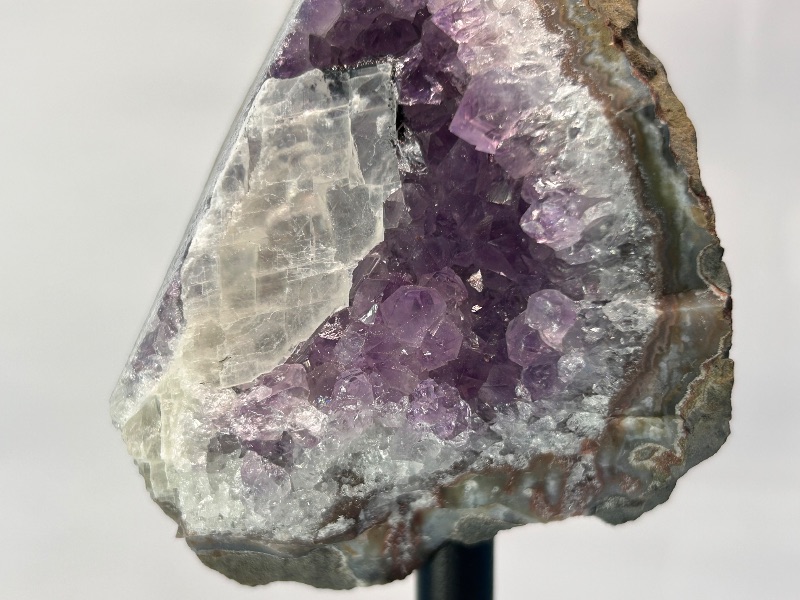 Photo 1 of 594108…4” amethyst crystal rock on display stand- height includes stand