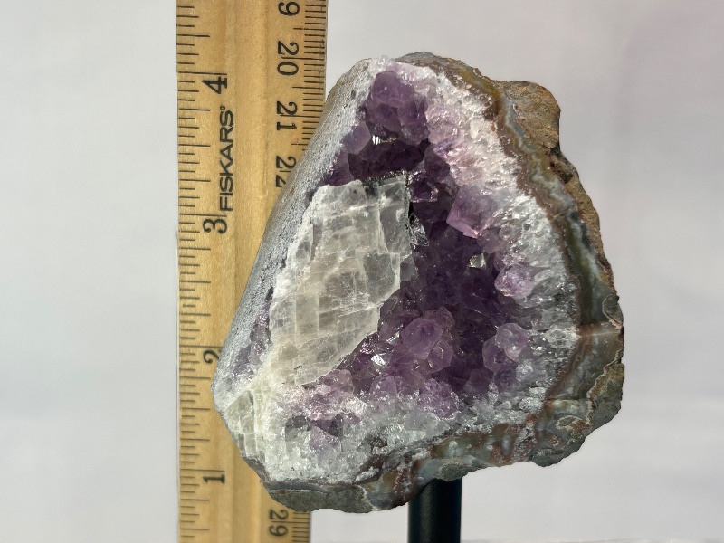 Photo 1 of 594108…4” amethyst crystal rock on display stand- height includes stand