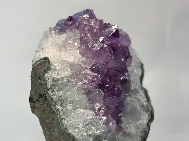 Photo 1 of 594109…4.5” amethyst crystal rock on display stand- height includes stand