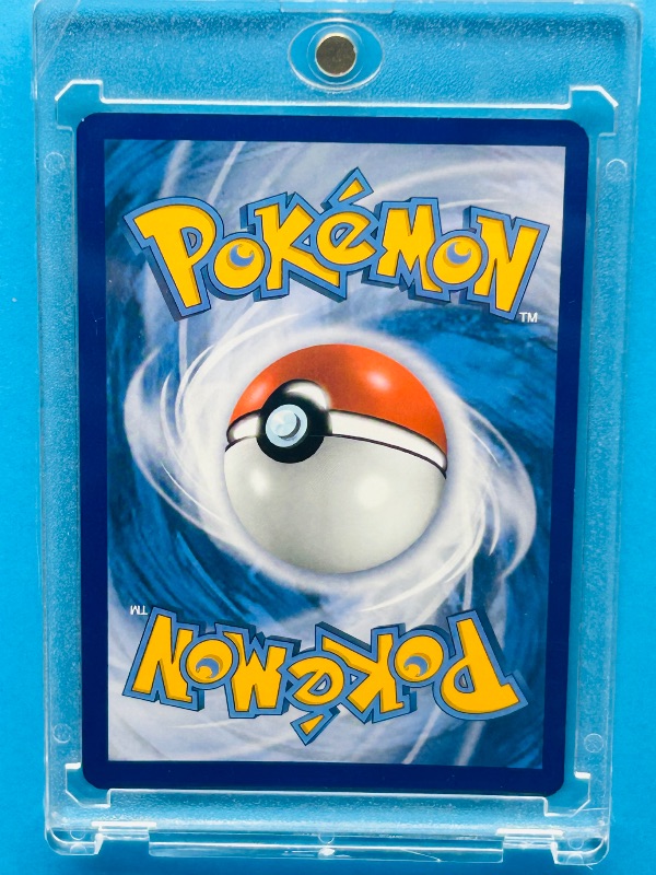 Photo 1 of 594375…Reverse holo Machop Pokémon card in hard plastic case