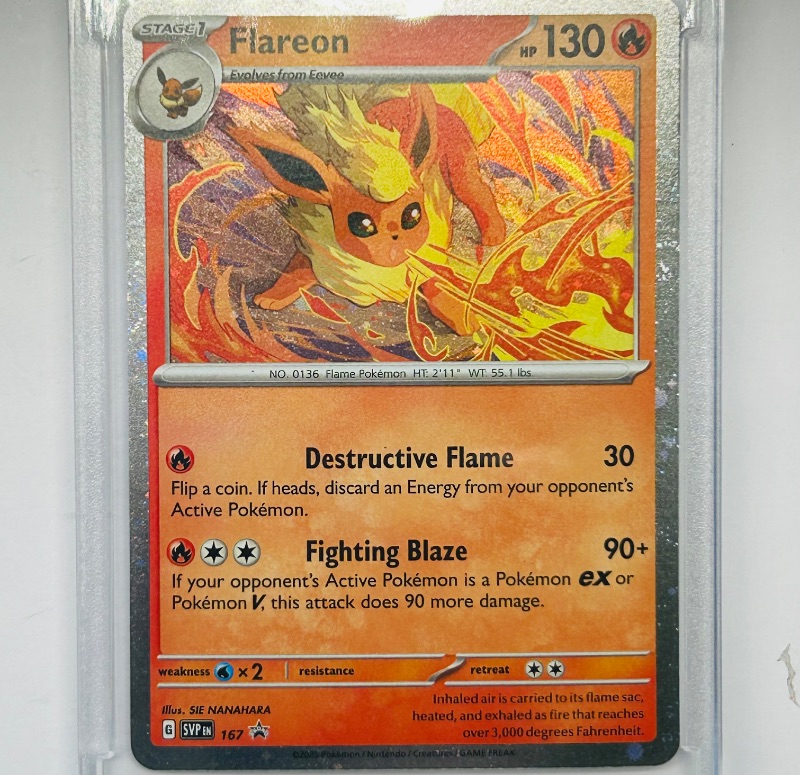 Photo 1 of 594377…holo Flareon Pokémon card in hard plastic case