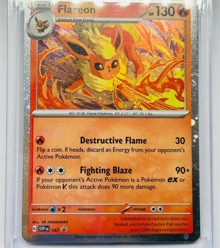View 3 of 594377…holo Flareon Pokémon card in hard plastic case