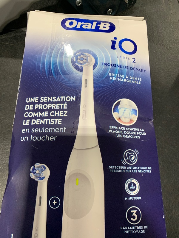 Photo 1 of Oral-B iO Series 2 Rechargeable Electric Powered Toothbrush Starter Kit, Pure White with 2 Brush Heads - Automatic Pressure Sensor to Protect Gums - 3 Modes - 2 Min Timer