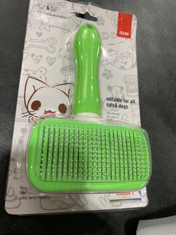 Photo 1 of Versatile Pet Grooming Brush and Deshedding Tool - Gently Removes Loose Undercoat for Cats and Dogs, Suitable for Pet Massage (Green Light)