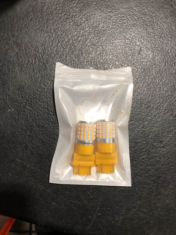 Photo 1 of PHINLION 3157 LED Bulb Amber Yellow, Super Bright 3156 4157 3757 3457A LED Blinker Bulbs for Rear Front Turn Signal Parking DRL Side Marker Lights, Non-polarity, Pack of 2