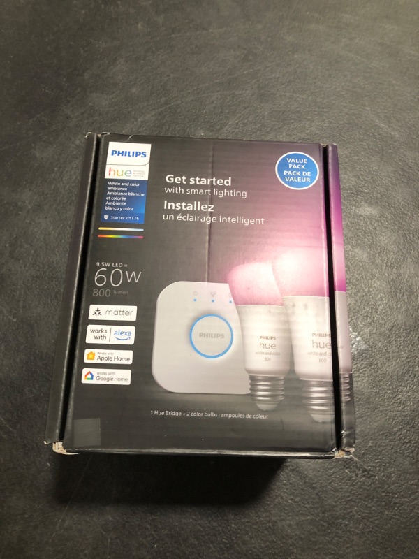 Photo 1 of Philips Hue Smart Light Starter Kit - Includes (1) Bridge and (2) 60W A19 LED Bulb, White and Color Ambiance Color-Changing Light, 800LM, E26 - Control with App or Voice Assistant