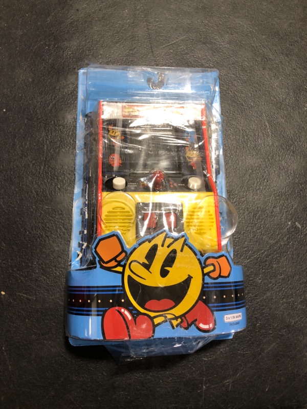 Photo 1 of Basic Fun Arcade Classics - Pac-Man Color LCD Retro Mini Arcade Game, 2 Players, Yellow