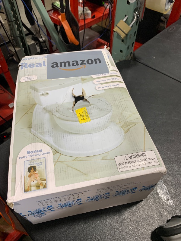 Photo 1 of Real Feel 2-in-1 Potty with Wipes Storage, Flushing Sounds & Disposable Liners - Realistic Toilet - Easy to Clean & Assemble - Jool Baby (Gray)