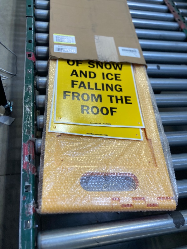 Photo 1 of SmartSign 25 x 12 inch “Caution - Beware Of Snow And Ice Falling From The Roof” Two-Sided Folding Floor Sign, Digitally Printed Polypropylene Plastic, Black and Yellow, Made in USA