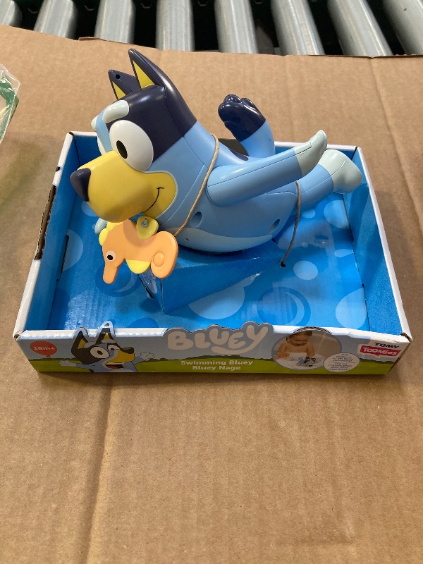 Photo 1 of Toomies Bluey Swimming Bath Toy - Bluey Toys Includes Attached Seahorse Baby Toy and Swims on Back or Front - Toddler Bath Toys and Water Toys for Outdoor Play – Ages 18 Months and Up
