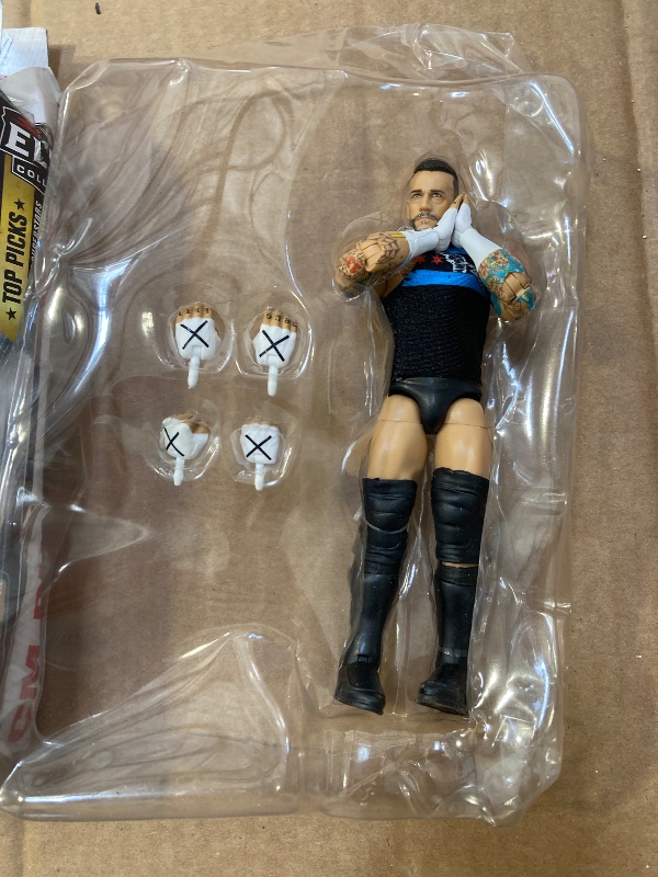 Photo 1 of Mattel WWE Top Picks Elite Action Figure & Accessories Set, CM Punk 6-inch Collectible with Swappable Hands, Ring Gear & 25 Articulation Points