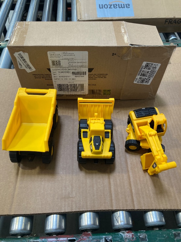 Photo 1 of CAT Construction Toys, Mini Crew 3-Pack 7”, Push-Powered Yellow Construction Vehicle Toys, Includes Dump Truck, Wheel Loader, and Excavator for Kids and Toddlers Ages 2+