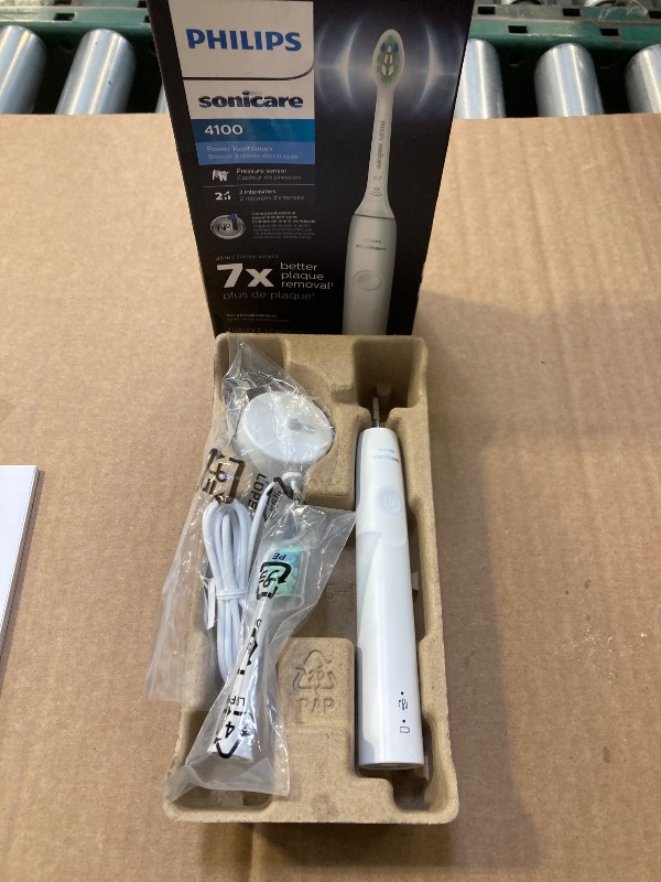 Photo 1 of Philips Sonicare 4100 Rechargeable Electric Toothbrush, with Pressure Sensor, 2 Intensity Settings, SmarTimer and QuadPacer, 14-Day Battery Life, White, Model HX3681/23