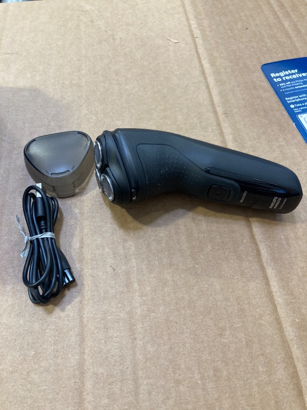 Photo 1 of Philips Norelco Shaver 2400 Series, Wet and Dry Electric Shaver, Pop-up Trimmer, P-Cap, Deep Black, Model X3001/90