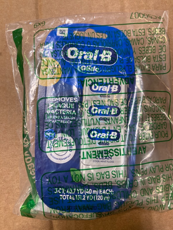 Photo 1 of Oral-B Glide Dental Floss, Shred Resistant, Gentle on Gums, Natural Wax, Slides Smoothly, Deep Clean Cool Mint Flavor, 40 M, 3 Count
