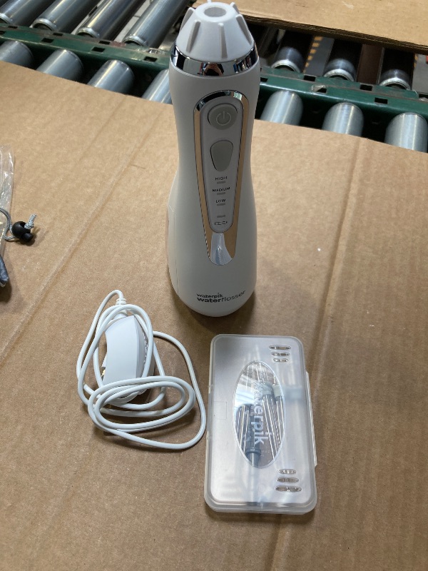 Photo 1 of Waterpik Cordless Advanced 2.0 Water Flosser For Teeth, Gums, Braces, Dental Care With Travel Bag and 4 Tips, ADA Accepted, Rechargeable, Portable, and Waterproof, White WP-580, Packaging May Vary