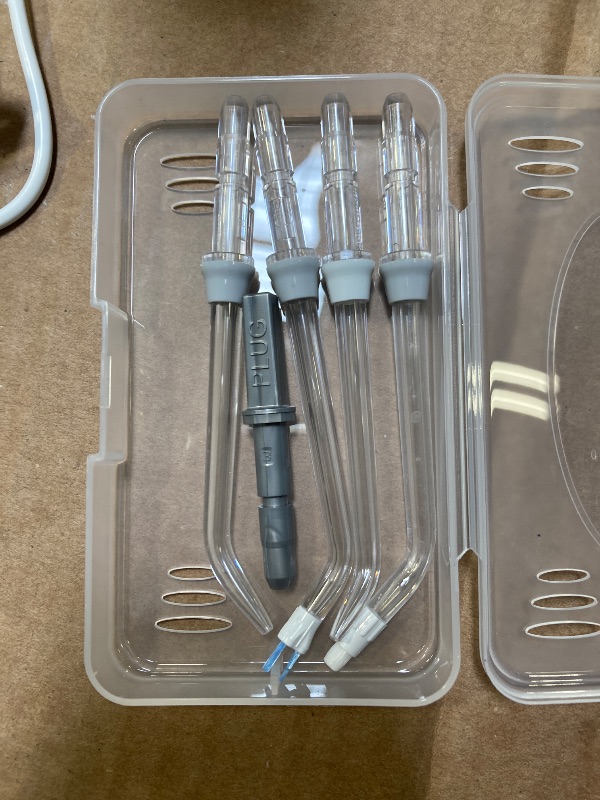 Photo 1 of Waterpik Cordless Advanced 2.0 Water Flosser For Teeth, Gums, Braces, Dental Care With Travel Bag and 4 Tips, ADA Accepted, Rechargeable, Portable, and Waterproof, White WP-580, Packaging May Vary