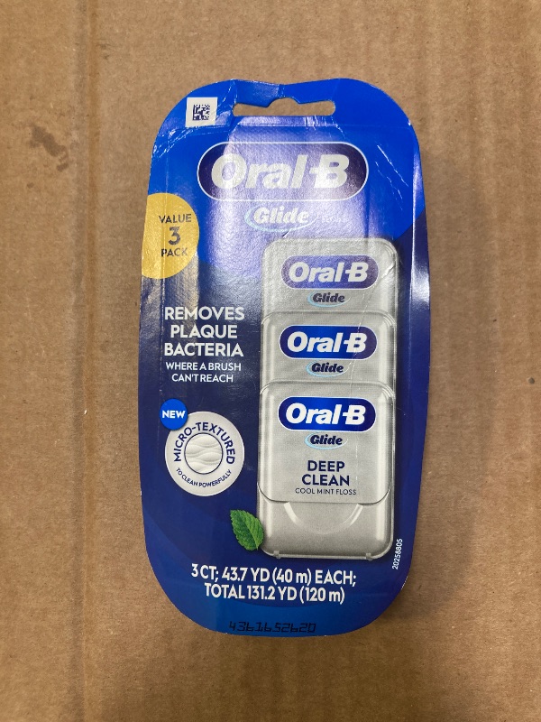 Photo 1 of Oral-B Glide Dental Floss, Shred Resistant, Gentle on Gums, Natural Wax, Slides Smoothly, Deep Clean Cool Mint Flavor, 40 M, 3 Count