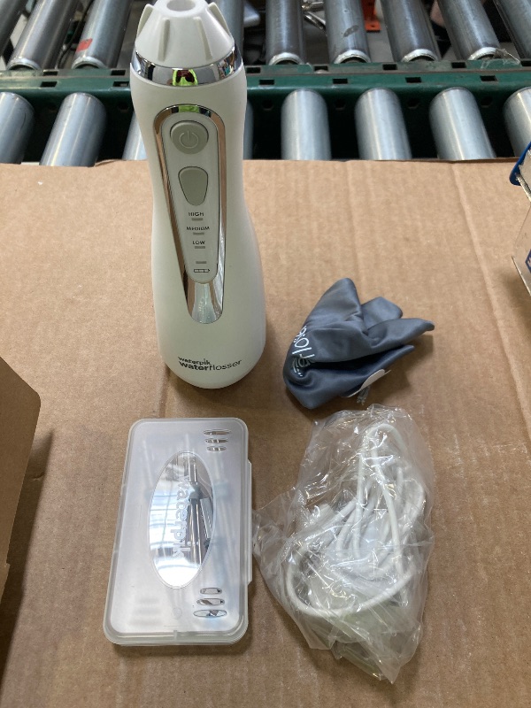Photo 1 of Waterpik Cordless Advanced 2.0 Water Flosser For Teeth, Gums, Braces, Dental Care With Travel Bag and 4 Tips, ADA Accepted, Rechargeable, Portable, and Waterproof, White WP-580, Packaging May Vary