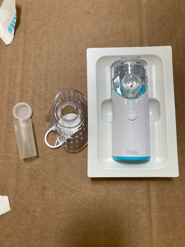 Photo 1 of Frida Baby Nebulizer for Babies, Portable Nebulizer for Kids, Babies & Infants, Ultra-Quiet Handheld Nebulizer with Mask + Diffuser, Congestion + Flu Relief