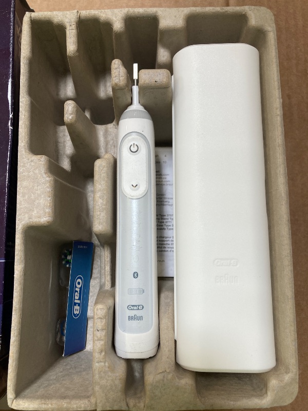 Photo 1 of Oral-B Genius X Limited Rechargeable Electric Toothbrush with 1 Replacement Brush Head, Travel Case, White