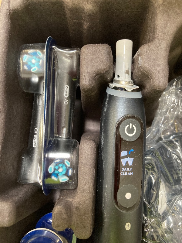 Photo 1 of Oral-B iO Series 9 Electric Toothbrush with 3 Replacement Brush Heads, Black Onyx