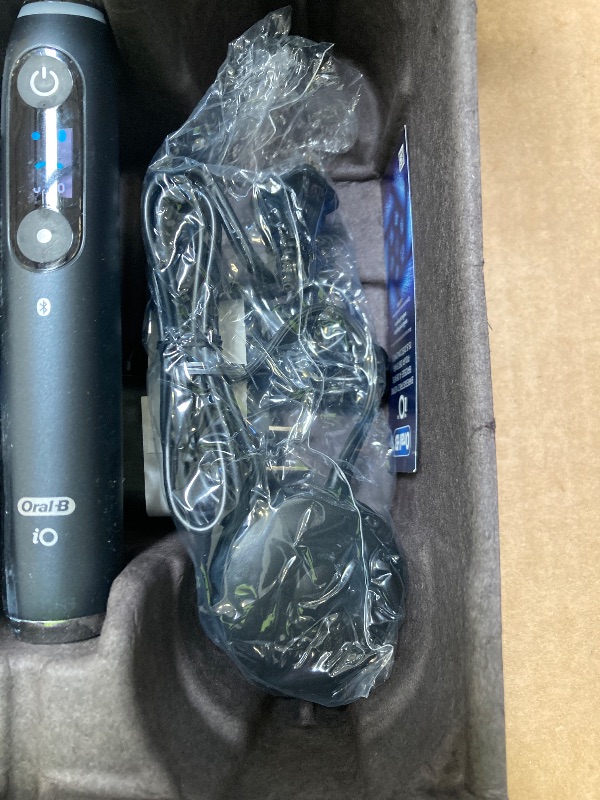 Photo 1 of Oral-B iO Series 9 Electric Toothbrush with 3 Replacement Brush Heads, Black Onyx