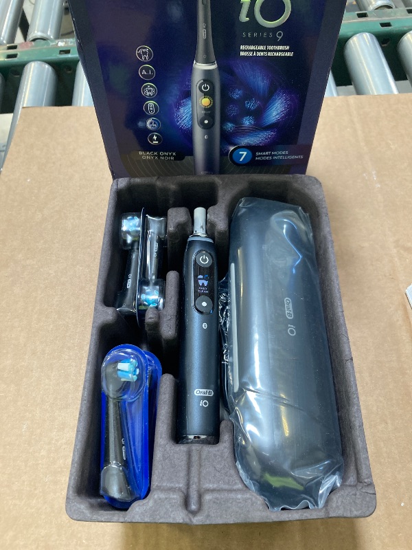 Photo 1 of Oral-B iO Series 9 Electric Toothbrush with 3 Replacement Brush Heads, Black Onyx
